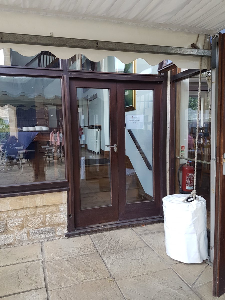 Come around the side of the entrance and through the door and upstairs.