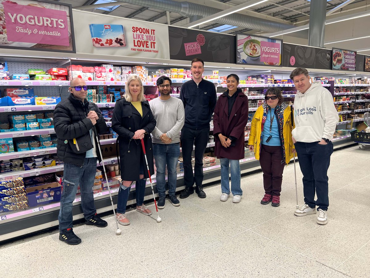 SLCouncils's tweet photo. Müller Yogurt & Desserts announces it will be the first in the UK #DairyIndustry to add @navilens codes to all its products, boosting accessibility for #blind & #PartiallySighted people. This follows work with #Birmingham & #BlackCountry SLC to #MakeRetailAccessible. Learn more: https://t.co/QO4LpNQlt2
NaviLens is an app which sees a high-contrast colour code printed on product packaging. The code is detectable by a smartphone camera from up to 12 times further away than a QR code. It also has a wide reading angle of up to 160 degrees. This means anyone using the app does not need to know precisely where the code is located to scan it.
Depending on shopper preferences, the app can then read or display product information on their phone using accessibility tools. This is for ingredients, allergens, nutrition and recycling information for the product.
Louise Connop, Sight Loss Council Senior Engagement Manager @PocklingtonHub, explains:
“Sight Loss Councils are proud of our partnership with Müller and our SLC volunteers to inform and increase the accessibility of packaging, to make their products more accessible for BPS people.
“As a person living with sight loss, accessible packaging means the difference between understanding what a product is and any potential allergens versus being unable to shop independently and pick products in the store on my own. Instead, I can simply now scan the packaging with my smartphone which will recognise and tell me about the product and its ingredients easily using the app.”
#VisionForChange