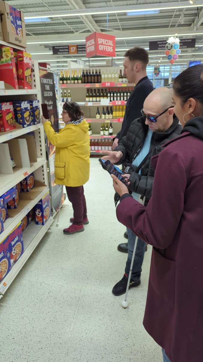 SLCouncils's tweet photo. Müller Yogurt & Desserts announces it will be the first in the UK #DairyIndustry to add @navilens codes to all its products, boosting accessibility for #blind & #PartiallySighted people. This follows work with #Birmingham & #BlackCountry SLC to #MakeRetailAccessible. Learn more: https://t.co/QO4LpNQlt2
NaviLens is an app which sees a high-contrast colour code printed on product packaging. The code is detectable by a smartphone camera from up to 12 times further away than a QR code. It also has a wide reading angle of up to 160 degrees. This means anyone using the app does not need to know precisely where the code is located to scan it.
Depending on shopper preferences, the app can then read or display product information on their phone using accessibility tools. This is for ingredients, allergens, nutrition and recycling information for the product.
Louise Connop, Sight Loss Council Senior Engagement Manager @PocklingtonHub, explains:
“Sight Loss Councils are proud of our partnership with Müller and our SLC volunteers to inform and increase the accessibility of packaging, to make their products more accessible for BPS people.
“As a person living with sight loss, accessible packaging means the difference between understanding what a product is and any potential allergens versus being unable to shop independently and pick products in the store on my own. Instead, I can simply now scan the packaging with my smartphone which will recognise and tell me about the product and its ingredients easily using the app.”
#VisionForChange