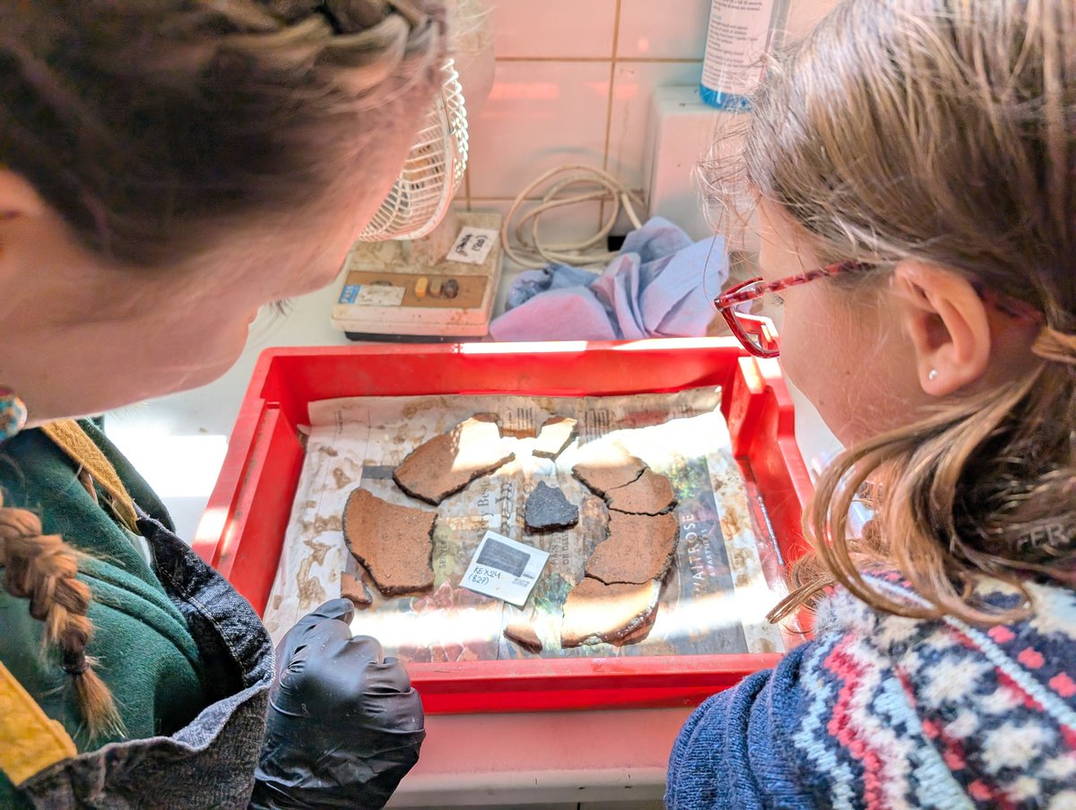 CotswoldArch's tweet photo. It's Volunteering Thursday here at our Kemble office!
Here's Eva and Tilly fitting together the recently washed sherds of a medieval pot found during our community excavations at #Kelmscott2024 👌
@KelmscottManor @SocAntiquaries #communitydig #archaeology #medieval #volunteers https://t.co/NufxU8NbA3