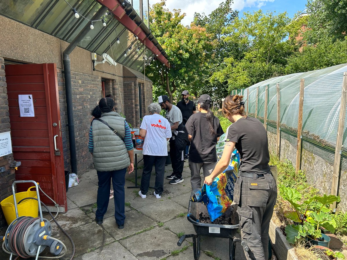 Fun in the sunshine during our Come n Grow lunchtime session today, potting the tomato plants! 🍅