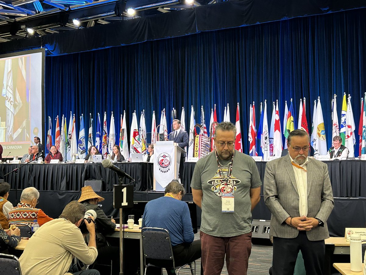 Two Assembly of First Nations delegates turn their back on Conservative Leader Pierre Poilievre as he makes his first in-person appearance at the AFN.