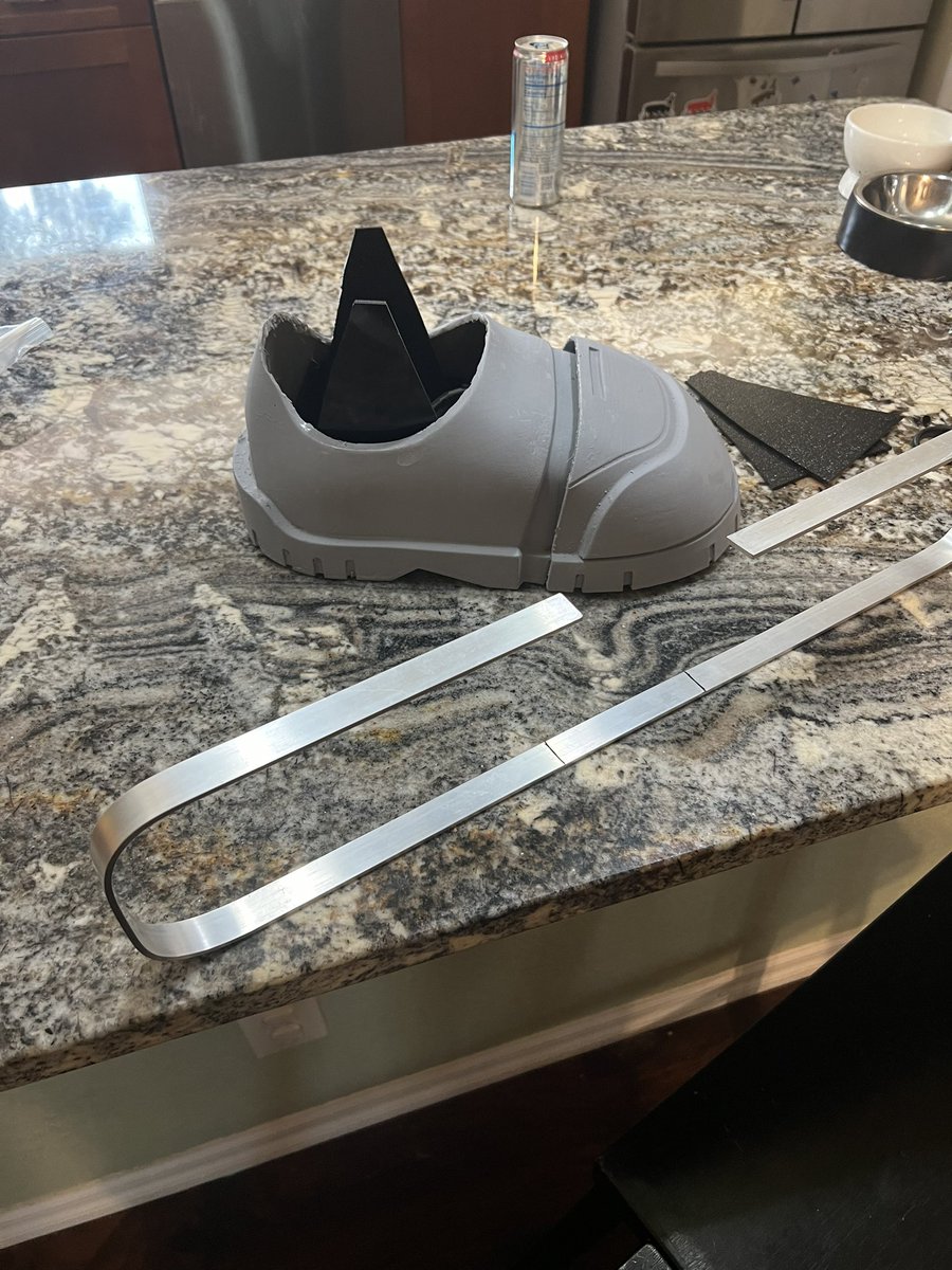 BuzzKnightyear's tweet image. Raining today so I can’t do as much as I wanted to on this project. I really wish I could get some whole days work on but just little bits at a time. Figuring out ankle joints to suspend the shin armor above the boot and still allow flexing in 4 ranges of motion.