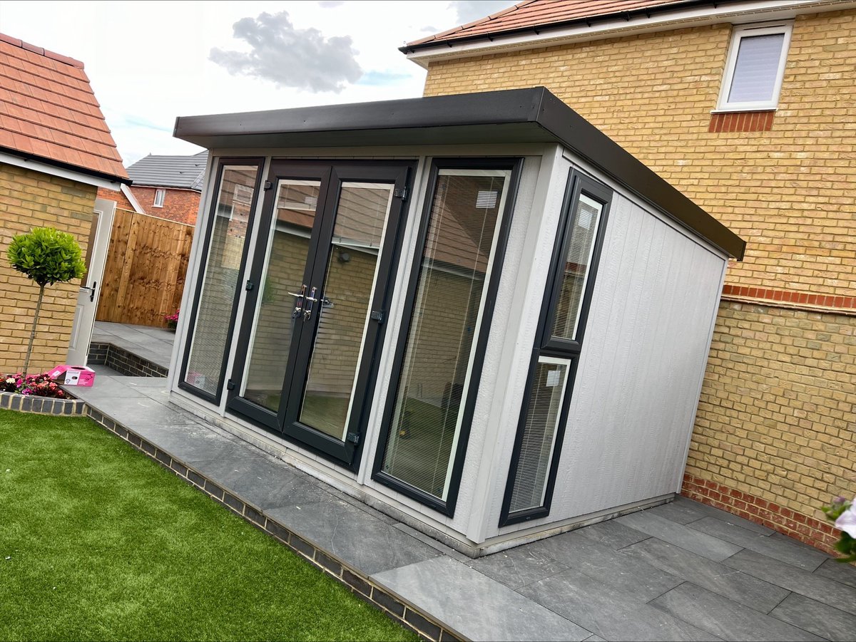 PhoenixShed's tweet photo. Our new installation is completed! This is a 12’ x 10’ Richmond Garden Studio 
~ Fully insulated and lined Garden Studio.
~ Strongcore exterior painted in Silver Grey.
~ External UPVC in Anthracite Grey with Integral Blinds.
#bespokebuilding #bespoke #summerhouse #gardensheds https://t.co/fDik7wQEgu