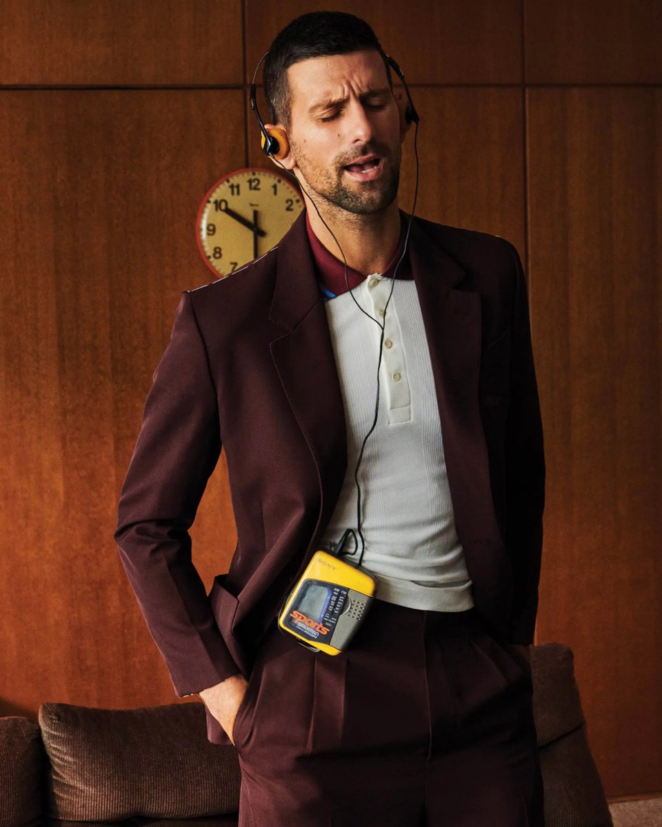 BastienFachan's tweet photo. Novak Djokovic, unbothered by the clock behind him striking the twilight of his career, listening to the sound of victory over and over again on a Sony Sports Walkman, released the decade he was born.

Phenomenal picture + creative direction.

📸 Branislav Simoncik/@voguemagazine https://t.co/d9ssyVYKy1