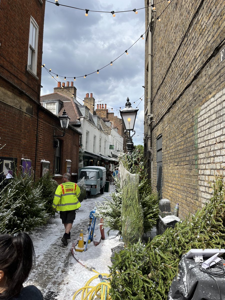 aeshields2's tweet image. Fake snow all over Flask Walk for the new Bridget Jones movie. With the weirdness of the weather in London this “summer”, who knows, maybe they won’t have to fake it for long.