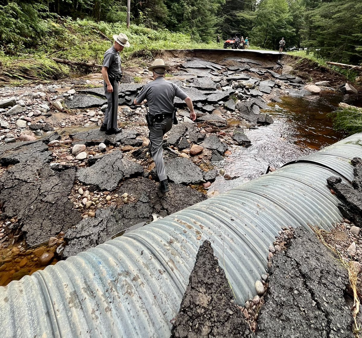 nyspolice's tweet photo. Lewis County: State Police continue to assess the flooding damage in the town of Watson.  The flooding has subsided but Buck Point Road near Beaver Lake  is not passable. https://t.co/ZC65O2zFTY
