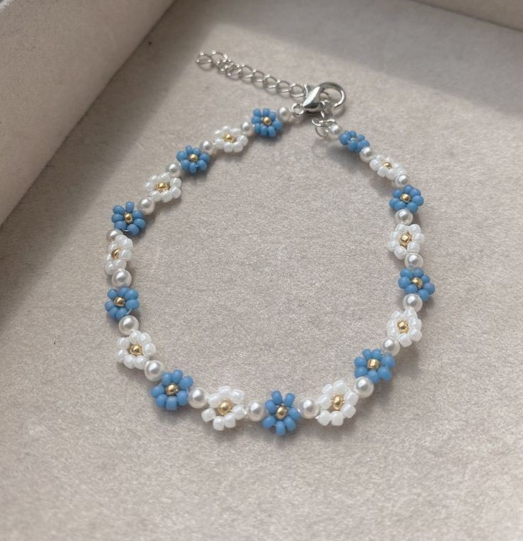 300moods's tweet photo. Beaded daisies bracelet 💙 https://t.co/EFgMoguYmE