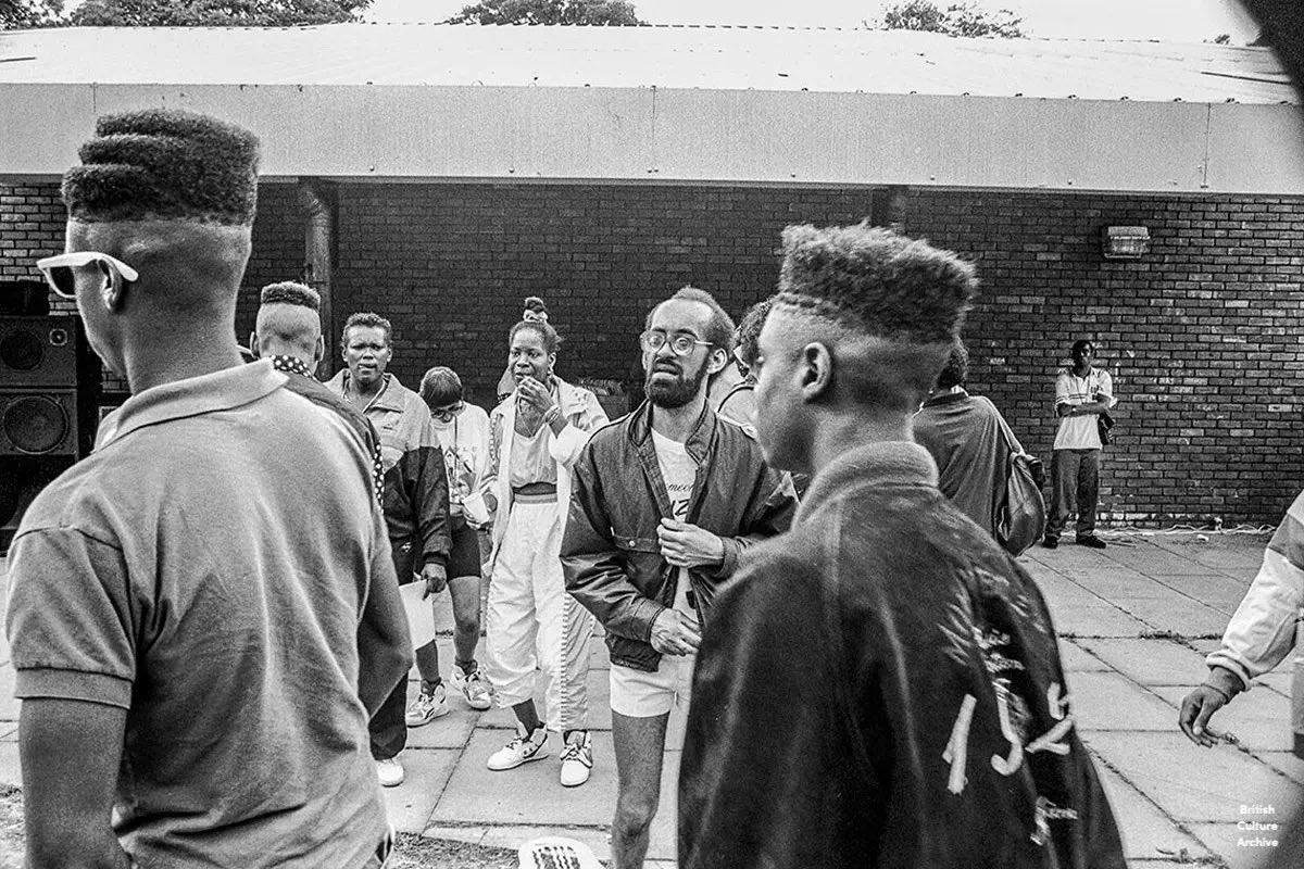 britcultarchive's tweet photo. Manchester Caribbean Carnival, Moss Side, 1989. 

All photos © Matthew Smith, all rights reserved.

Matt: "Along with St Paul’s and Notting Hill, there’s another great Afro-Caribbean community carnival, and it’s in Manchester. These images were made while I was still at college, just half an hour down the road from Manchester and all things mad.

"As punk morphed into two-tone while I was still at school, and The Clash made White Man in Hammersmith Palais, reggae was a natural progression in listening pleasure before rave, in all its mental loved-up glory, took over everything. Consequently, carnival in Manchester was a logical event destination. The Hac was in the same town, and we’d taken in that too. There was even a drug store in Moss Side that actually sold drugs, and the Robin Hood pub was just legendary. 

"At that time, photography was either arty student conceptual or Edward Weston and Ansel Adams. I hadn’t yet learnt that what makes photography unique and valuable is what the person behind the camera brings to it. In the meantime, check out the haircuts and the hip-hop battle."

Gallery now online at BCA: https://t.co/cwM7dvhnfo