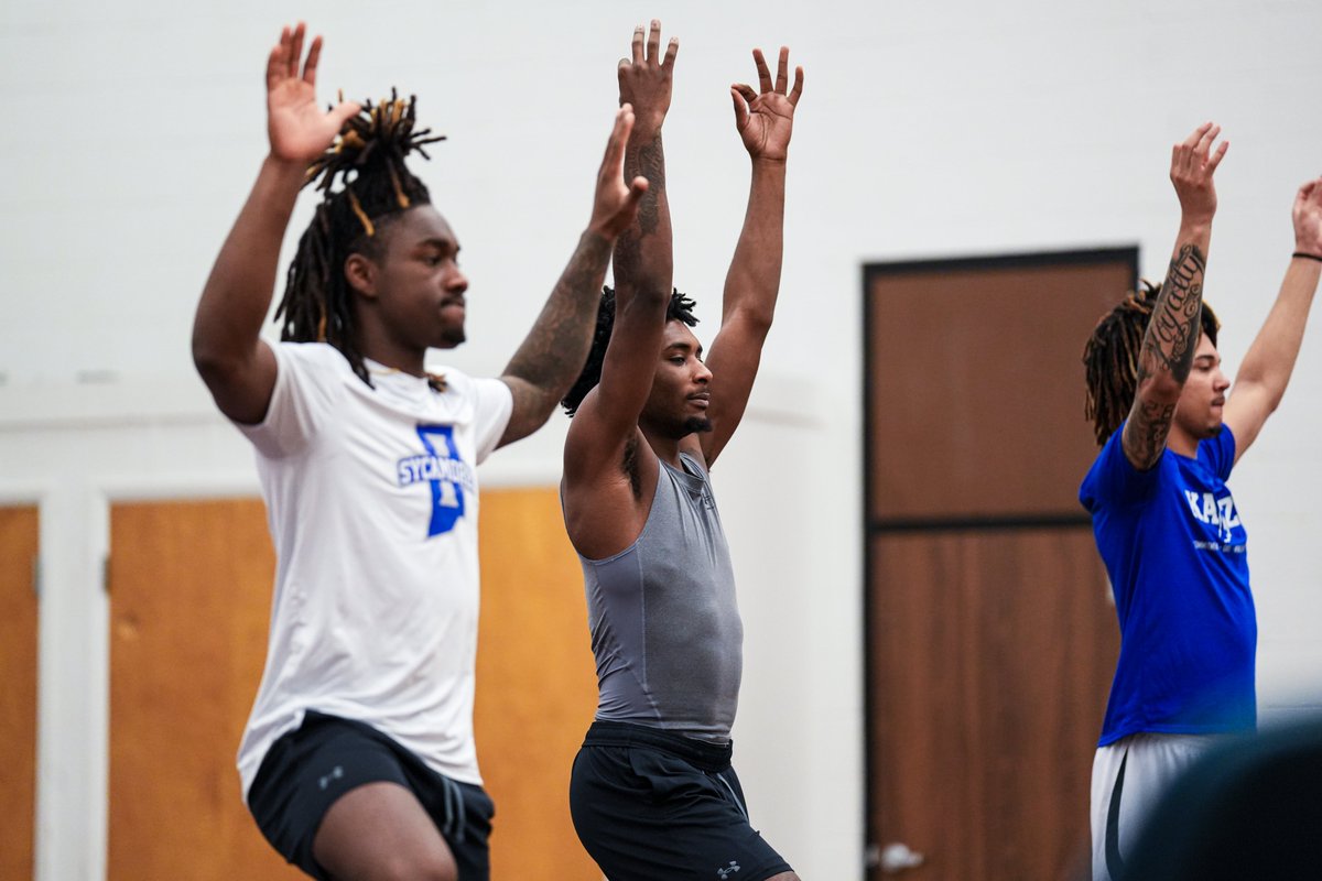 IndStBasketball's tweet photo. Our weekly dose of yoga with @SHamilton_ATC  🧘

#MarchOn https://t.co/8i2T8EfdAL