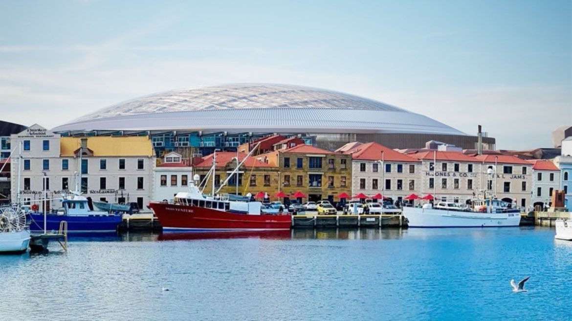 chrisroww's tweet photo. First look at Macquarie Point stadium design as viewed from Mures on the Hobart waterfront.

The image has been rendered by stadium designer COX Architects.

Overlayed version reveals its impact on Hunter Street, compared to renders released by an anti-stadium group last year. https://t.co/cC6yxnlTRo