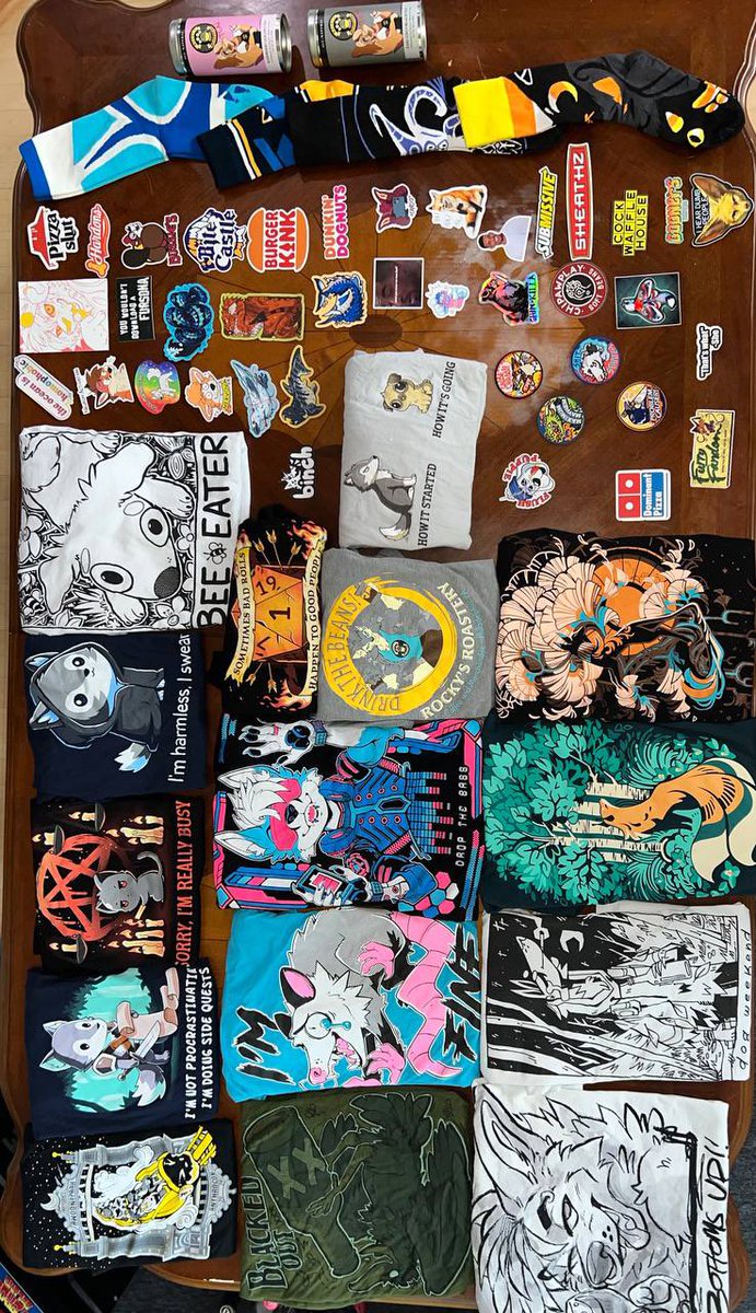 The #Anthrocon2024 loot haul &lt;3
Missing an about a dozen tubes of tea as well as a Light and Medium roast from Rocky’s Roastery.