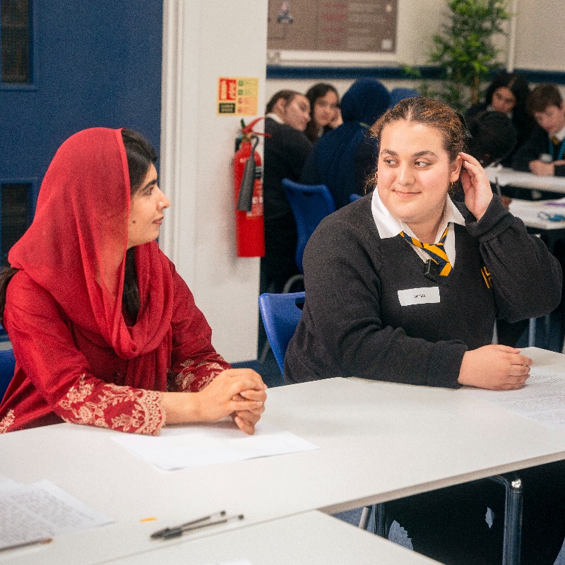 MalalaFund's tweet photo. Every year on her birthday, @Malala meets with girls to hear their stories &amp; amplify their demands.

This year, she spent her birthday with Afghan students at @HarrowHighSch in London. Together they rallied classmates, worked on a mural &amp; wrote letters to girls in Afghanistan 💌