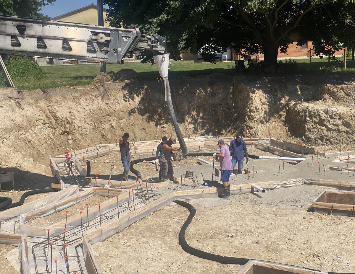 CCreteTech's tweet photo. Last month, C-Crete was poured in a 3-story ground-up residential building near Toronto, marking the first-ever use of cement-free concrete in the entire Canada. The project, totaling 400 cubic yards of concrete, commenced with 60 cubic yards poured for the footings, with the remainder earmarked for walls, columns, slab-on-deck, driveway, etc. Unlike the US, there was no direct ASTM C1157 standard code or a precedent for pouring Portland cement free concrete in Canada. However, the building owner, Trevor, navigated these challenges by leveraging the closest equivalent standard code in Canada (with inputs from C-Crete). His persuasive efforts convinced both the building inspector and structural engineer, paving the way for future adoption of this eco-friendly product in Canada. With Canada's harsh winters, this pour stands as the ultimate durability test for C-Crete under extreme conditions.