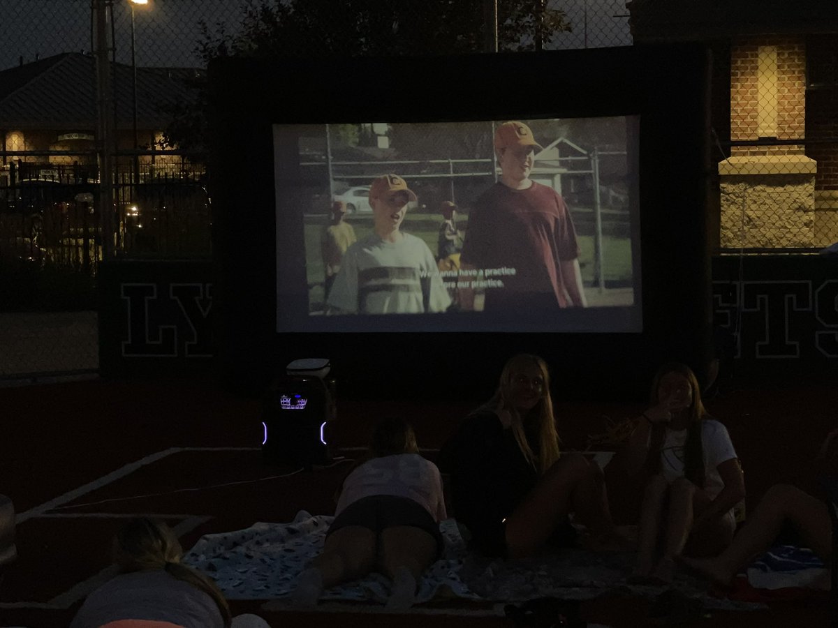 Team movie night at the field, we are watching Benchwarmers!🧡🖤