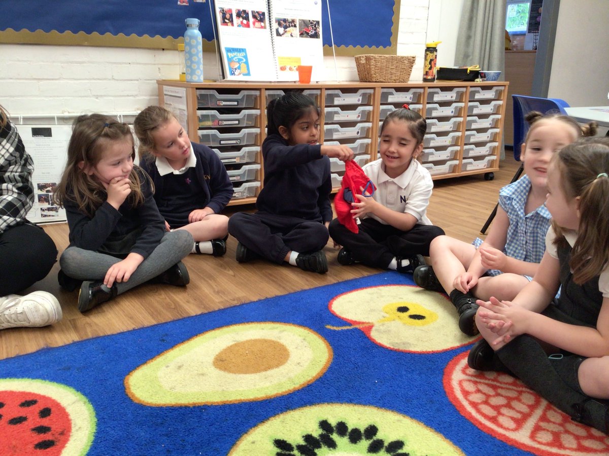 EYFS - Science Detectives...We have been using our sense of touch, to explore how we can feel the world around us. We played 'pass the bag' around to try and guess the different objects in the bag. The children used some lovely describing  words, e.g.; bumpy, spikey and smooth.
