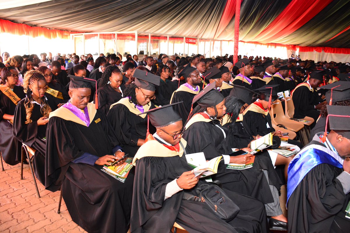 PACUniversityKE's tweet photo. Happening Now: Graduands eagerly following the graduation ceremony, which is now in full swing. 
Congratulations, class of 2024. 
https://t.co/fSnpxrgNF4
#PACGraduation #43rdGraduation https://t.co/Vb31nnFZkO
