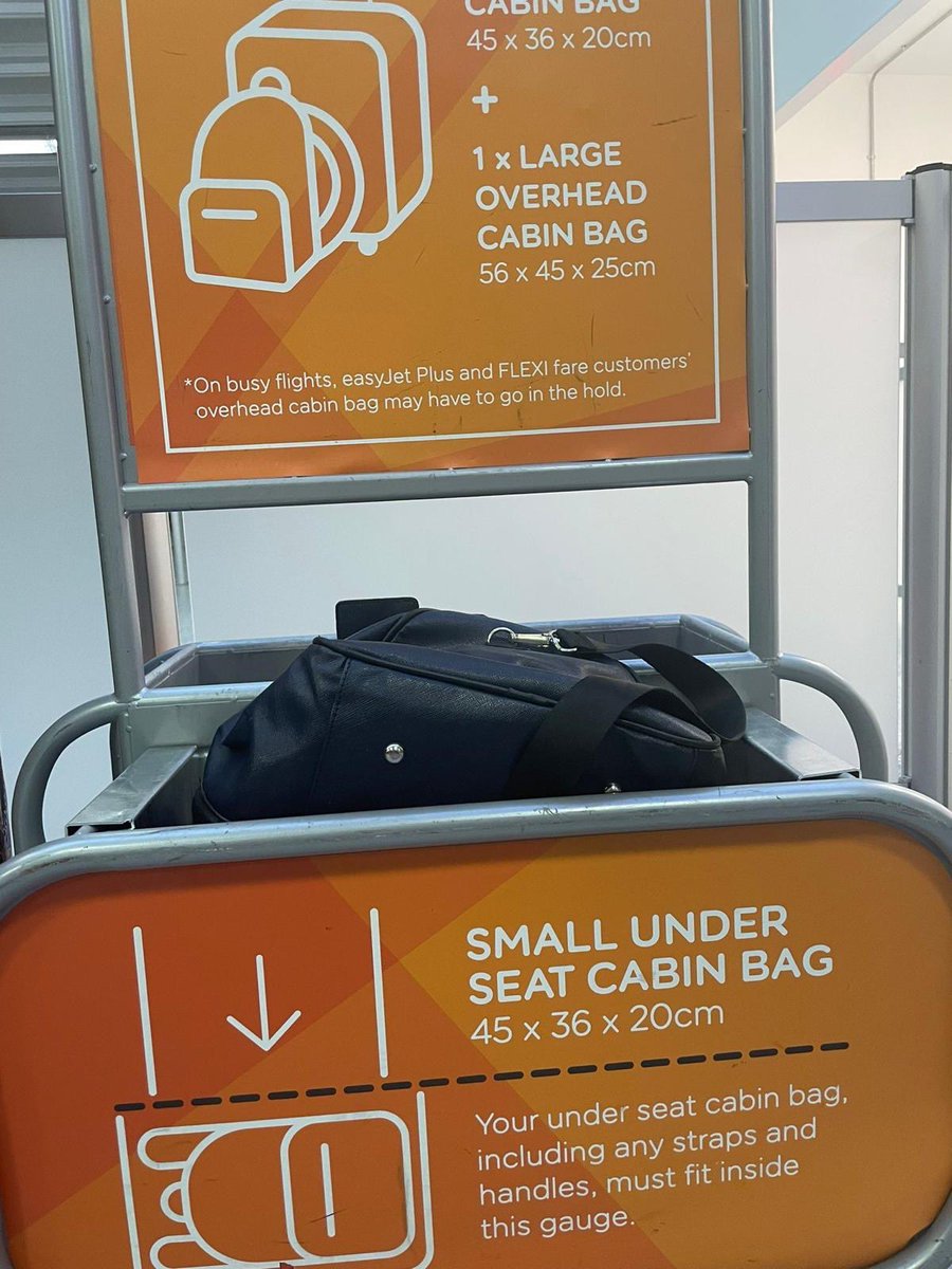 wowsoph's tweet photo. @easyJet 
Please can you explain how a bag that fit like this justifies a £48 charge with the staff saying it was ‘squished too much’. I have taken it on countless other flights before with no issues. https://t.co/zH4g6qLOhN