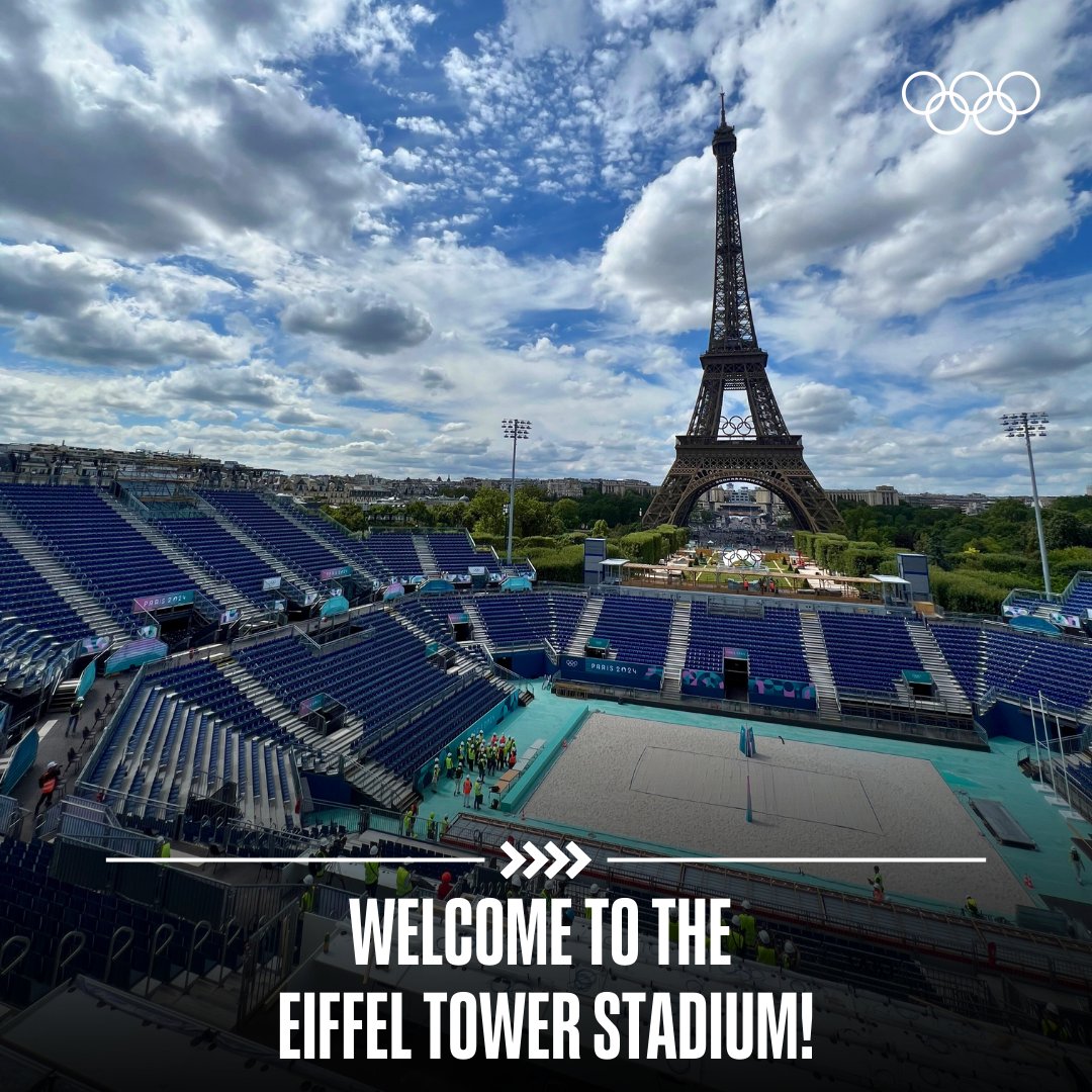 Olympics's tweet photo. The Eiffel Tower Stadium at the #Paris2024 Olympic Games! 
Witness beach volleyball in a truly magical setting, from the historic Champ de Mars to the iconic Eiffel Tower. ✨🏐

@Paris2024