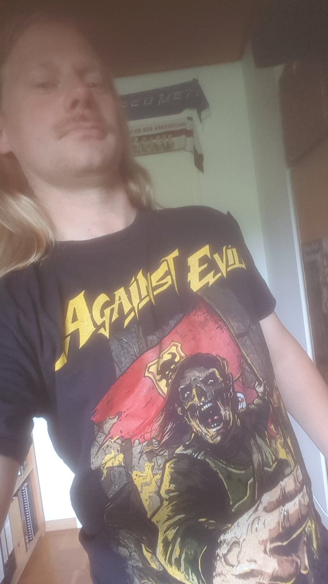 Domaniac42's tweet photo. Happy #ReleaseDay to my buddies in #AgainstEvil this #Bandshirtfriday! #GiveEmHell https://t.co/VhuD4LveGz