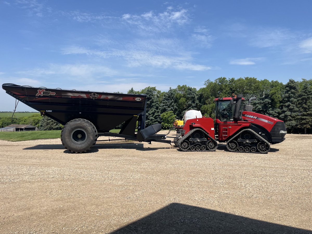 Out at Bruno yesterday helping to get this ⁦<a href="/JMManufacturing/">J&M Manufacturing</a>⁩ ready for #harvest24. The Black paint with #Canadian decal looks great behind their Case #quadtrack What a #beautifulday