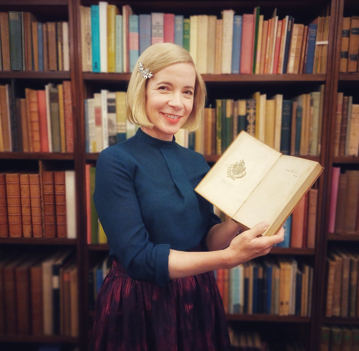 Lucy_Worsley's tweet photo. My pals at @theUL (the University Library Cambridge) gave me the treat of holding one of Jane Austen's books. Not one she wrote, but one she owned herself, and wrote her name in. Stay tuned for some exciting Jane Austen news from me next week! 😉 https://t.co/PwWRRqTww5
