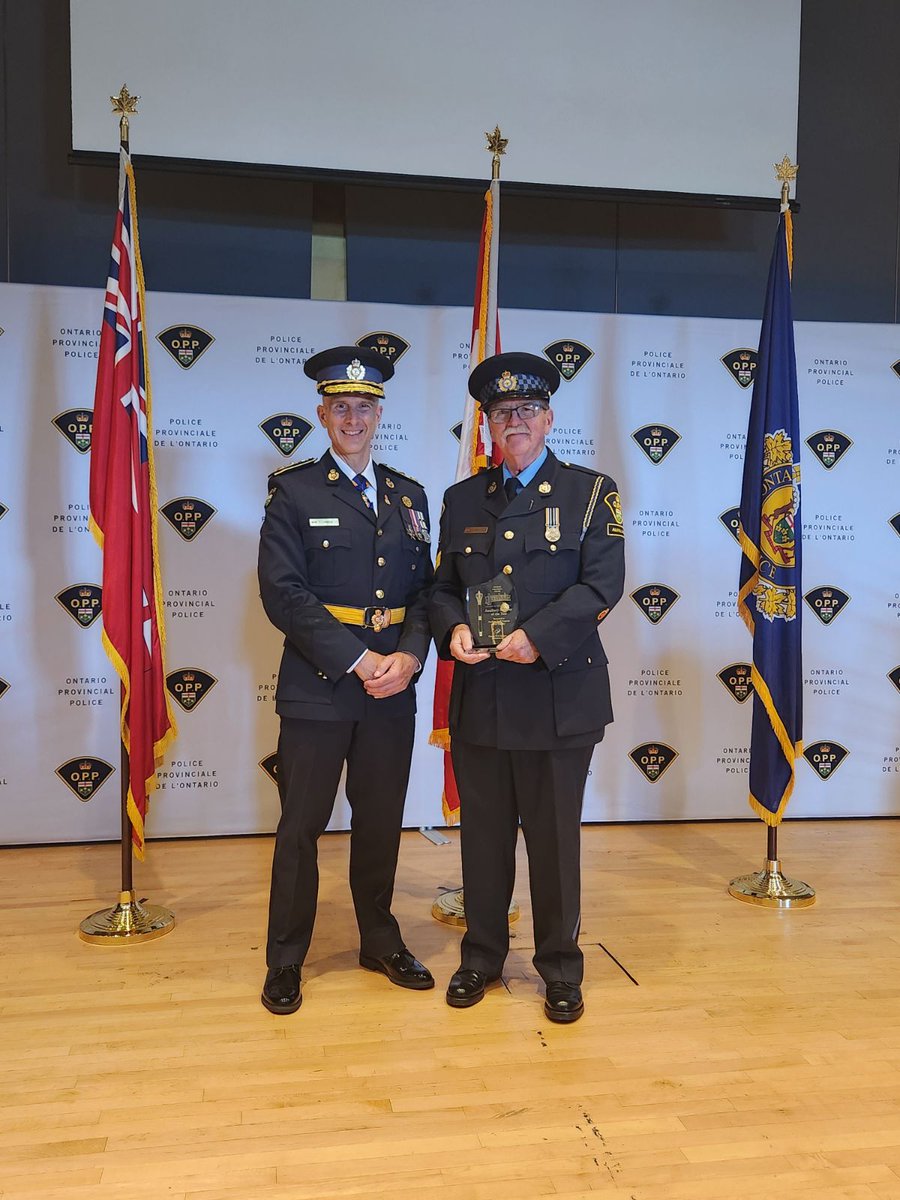 OPP_WR's tweet photo. On July 11, 2024, the Ontario Provincial Police (OPP) held the Ontario Provincial Police 2023 #AccoladeAwardCeremony at OPP General Headquarters (GHQ) in Orillia.

An #auxiliary officer who works with the #GreyBruceOPP was among those honoured for their exceptional efforts in service with the OPP.  The Auxiliary Member of the Year Accolade Award was presented to Auxiliary Staff Sergeant Tom Buckley.  In 2023, Tom has volunteered over 1000 quality hours with the Auxiliary Unit for the betterment of his community and the OPP.  These hours consisted of ride-a-longs with officers, community events and training at the OPP GHQ.

“Auxiliary S/Sgt Tom Buckley has been a dedicated auxiliary member since 1995, devoting countless hours every year. He is a highly respected member of the Grey Bruce OPP and takes immense pride in his position. We are lucky to have him leading our Grey Bruce Auxiliary program, that participates in so many events in our communities. He is very deserving of this prestigious award.” – Staff Sergeant Marla Barfoot.

If you are interested in joining the Grey Bruce OPP Auxiliary Unit please visit Ontario Provincial Police - Auxiliary Policing Program (https://t.co/hg2eaFf5Om).  If you have any questions, please contact your local OPP detachment, and ask to speak to their recruit ambassador. ^kl