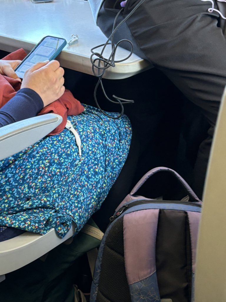 1998ebt's tweet photo. Why does @ScotRail not limit the amount of passengers allowed on a train? This isn’t the first time I’ve been on an absolutely
heaving carriage and it’ll only get worse during the Fringe. People are sitting on tables and doorways are packed - surely a safety issue https://t.co/uNc4KU5QM2