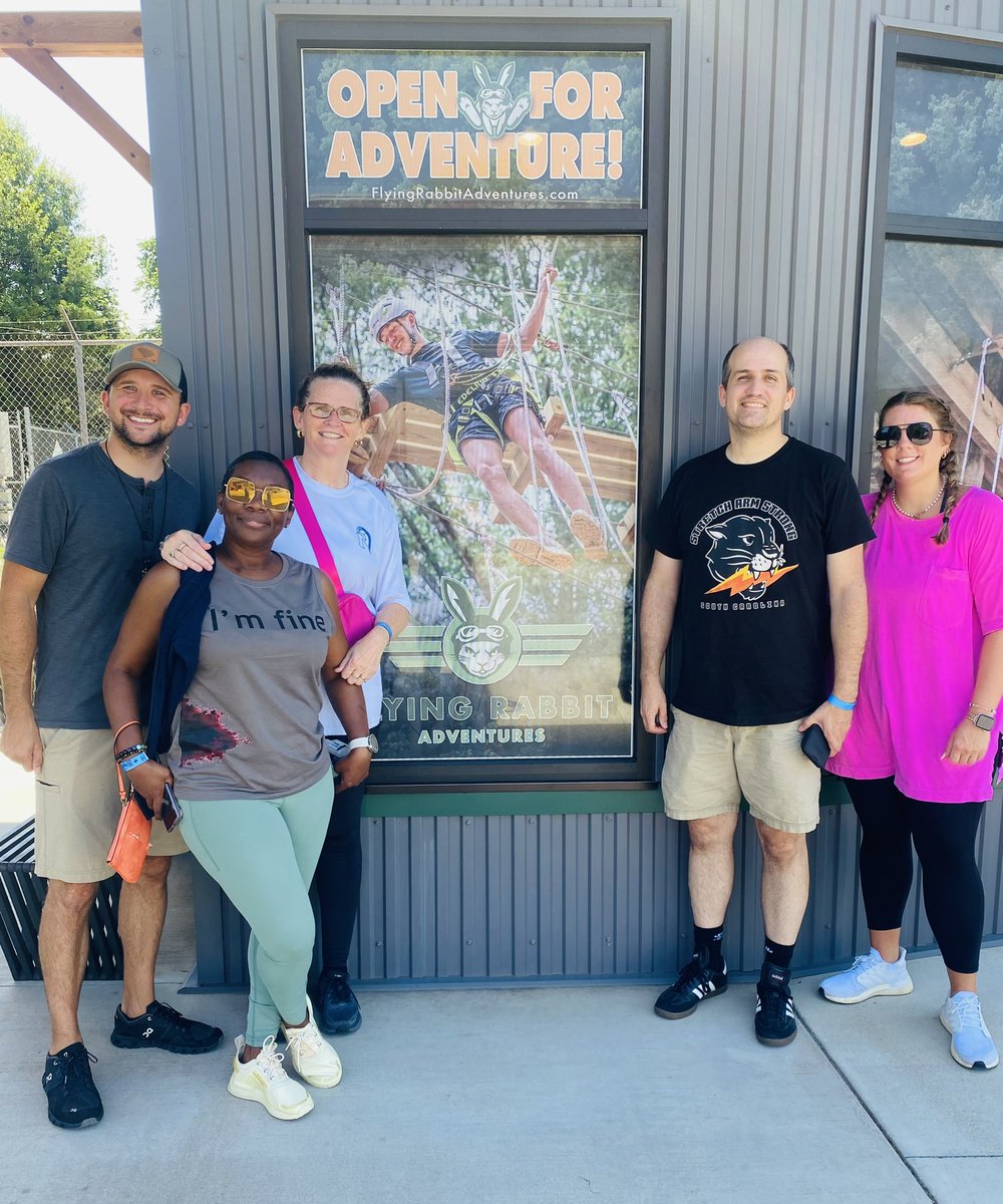 Team building can happen anywhere, from up in the trees on a ropes course to the open air of zip lining across a park! Now, the Northwest Middle admin team is ready for another adventurous school year! #NorthwestMiddle #PantherPride #TeamBuilding #RopesCourse #ZipLine #Admin