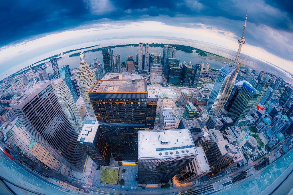 An incredible shot from <a href="/thelandofdustin/">Dustin</a> frames the skyline and soaring skyscrapers of Toronto's Financial District 📷️ #toronto #torontophotographer