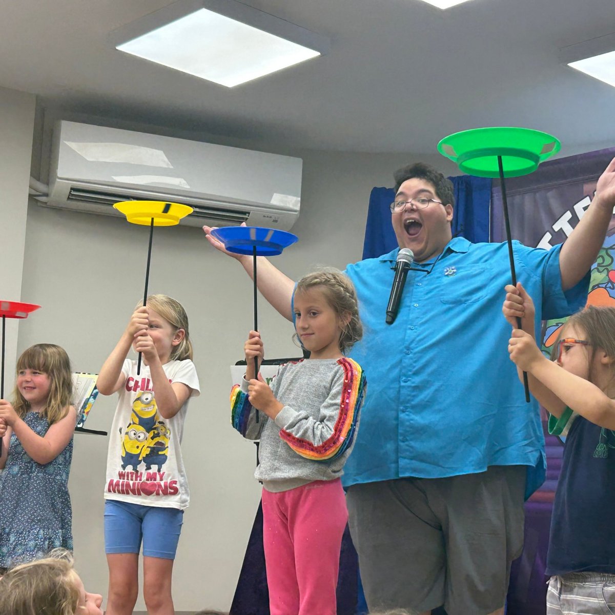 TuxParkLibrary's tweet photo. We're SO excited to have our friend Conrad Cologne back at TPL in ONE WEEK! 🚀Check out these pictures from last summer's performance, then register your kids aged 4 - 12 to join Conrad for an all new adventure on Thursday, July 25th at 4pm! Sign up: https://t.co/4Nk6ZOweKv https://t.co/5PBy3F6SMh