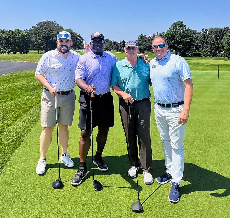 Paul Lambert, John Randle, Tom Barnard, and PGA Head Golf Professional Jake Vogt enjoying the day at The Club at Golden Valley!