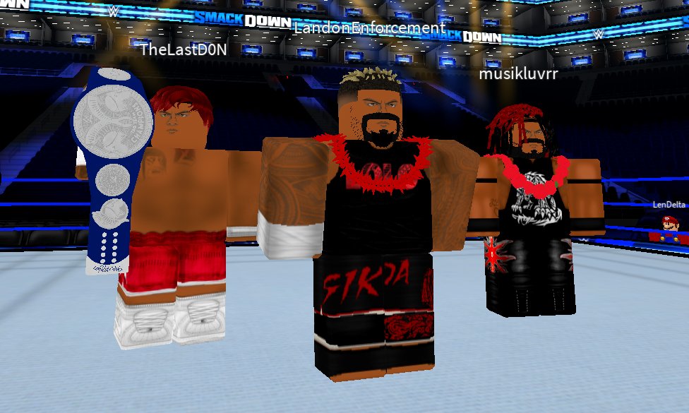 WWEAS_'s tweet photo. THE BLOODLINE ARE SMACKDOWN TAG TEAM CHAMPIONS.

#SmackDown https://t.co/Q1fjg8KdIi