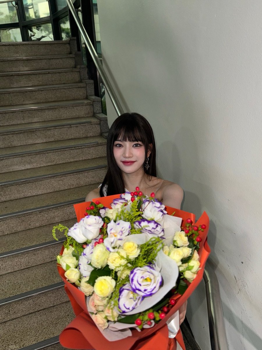 ISA WITH FLOWERS