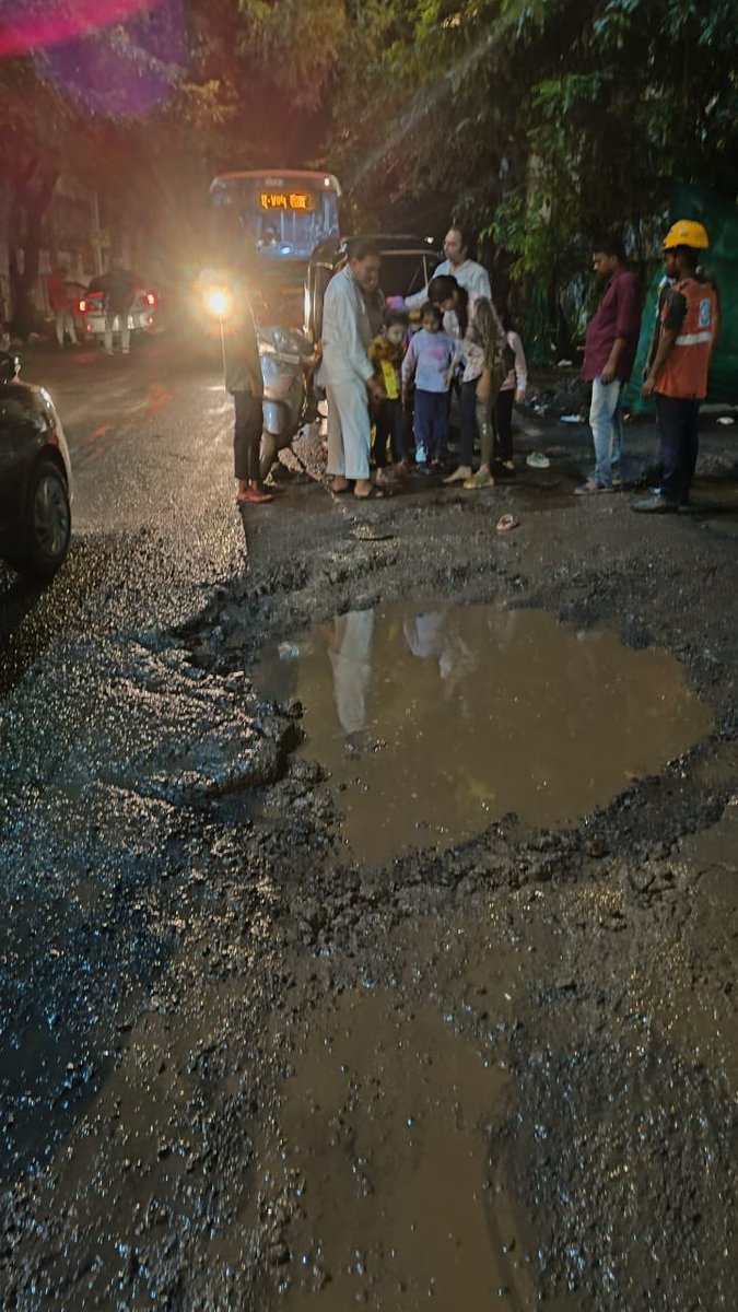 Nice Crater, <a href="/mybmcWardT/">Ward T BMC</a> please investigate if a Prestige(out) Meteor dropped here by any chance. 
Construction vehicles taking its toll on Yogi Hills road which used to be one of the most serene and well maintained roads.