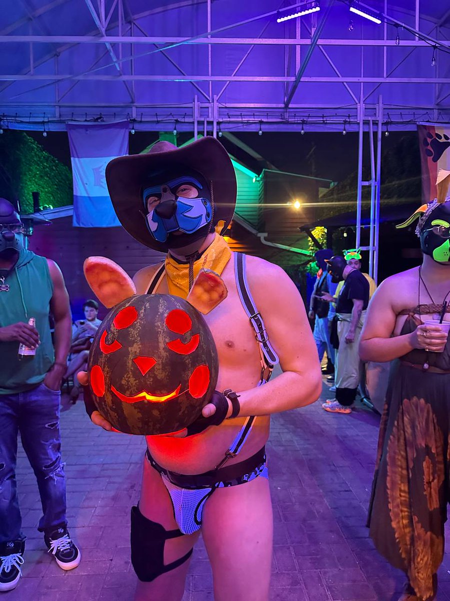 Pup_Static's tweet photo. Howdy puppies! I was a cowboy puppy tonight at Pupplet's Summerween party at the @LeatherStallion. I got to hold the watermelon-o-lantern! https://t.co/hkZmGBsyS0