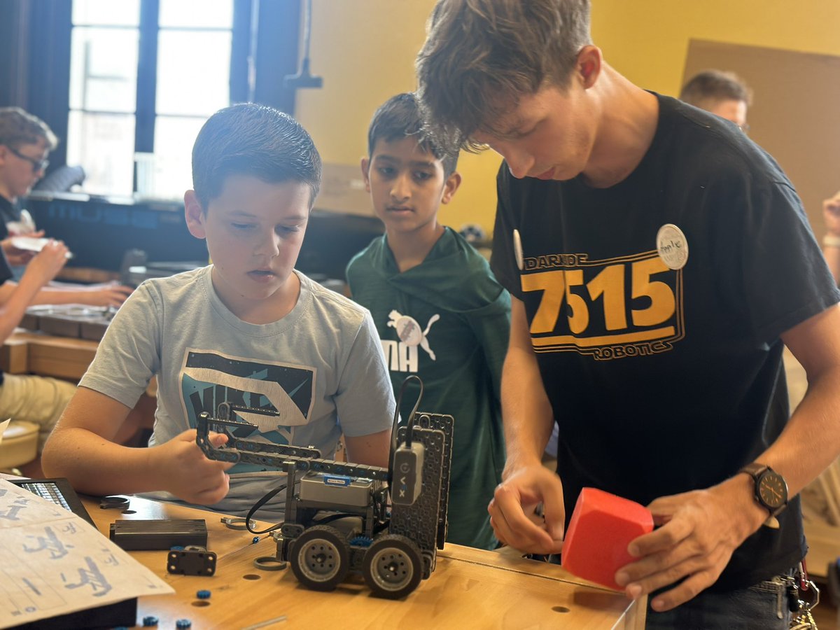 DarkSideRobots's tweet image. Campers finished building claws for their robots, experimented with coding to pick up and move pop cans to different segments of the field. 

All the robots and campers participated in a final “robot parade”, and we closed out the camp by disassembling our hard work.