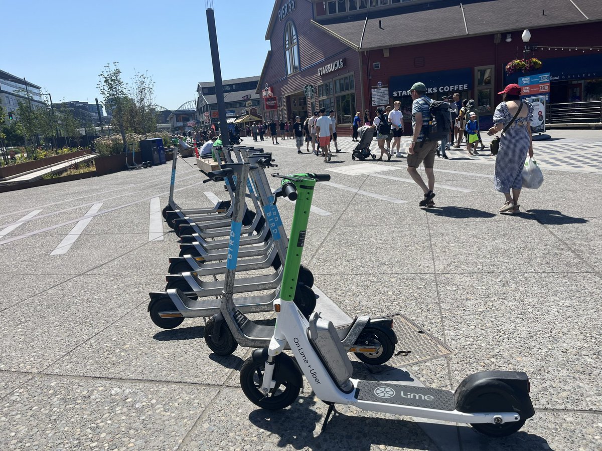 EHDDSeattle's tweet photo. @Qagggy @WaterfrontSEA How about this situation - Lime scooters littering the public space. https://t.co/GUNe0p96fn