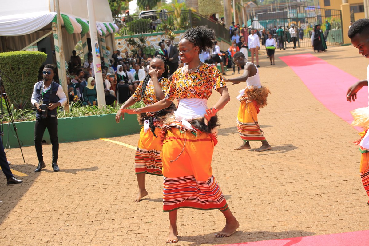 kiuvarsity's tweet photo. Baganda Nkobazabogo students captivating the audience at the #KIU29thGrad https://t.co/poxQTuy7n7