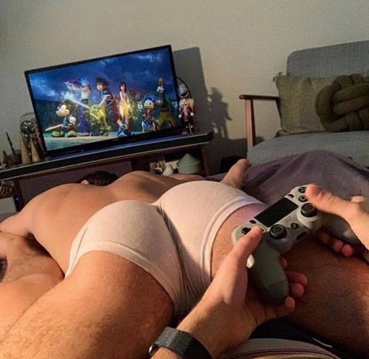 Don't mind him laying there while you play games!
