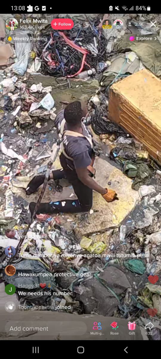BigJoe_KE's tweet photo. This guy is being captured live on TikTok wading through the sewage trying to get to the dead bodies; no protective gear, no nothing, just being a good citizen. Na ati tuko na gava? #RutoMustGo https://t.co/N5VyTdMDxa