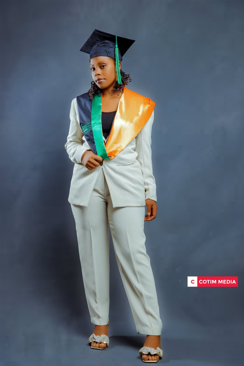 Happy KIU Graduate in Studio Photo-shoot
