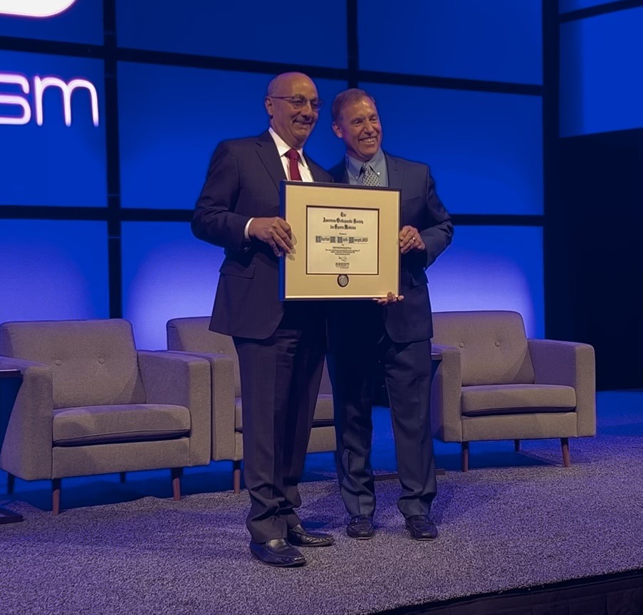 aossm1972's tweet photo. Dr. @cbushjoseph of @MOR_Docs was inducted into the AOSSM Hall of Fame today! Join us in celebrating his significant contributions to orthopaedic sports medicine and the Society. https://t.co/I0Mzt5KFIx