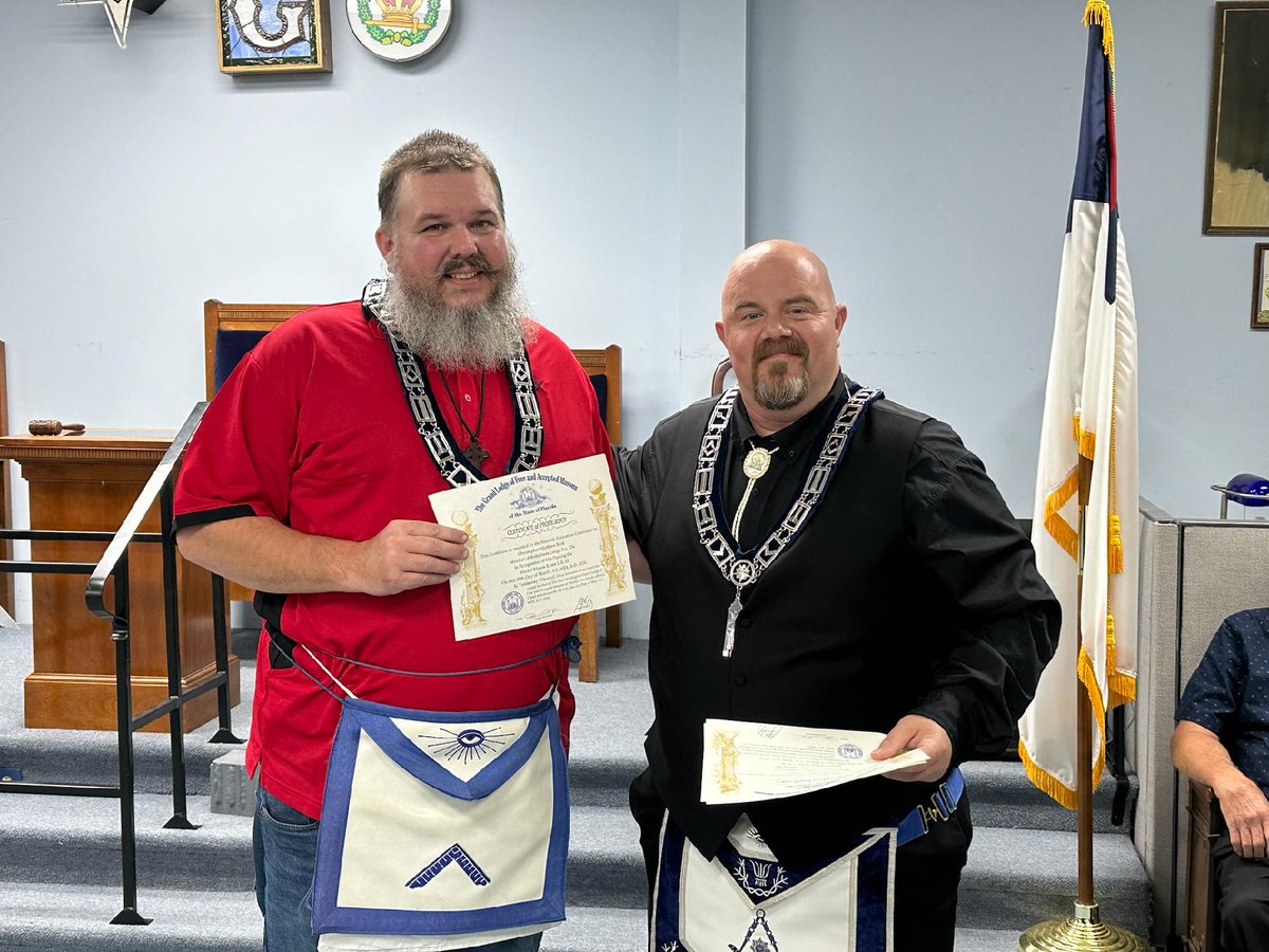 Right Worshipful Jimmy Bosch distributed certificates of completion of the Master Mason written exams.