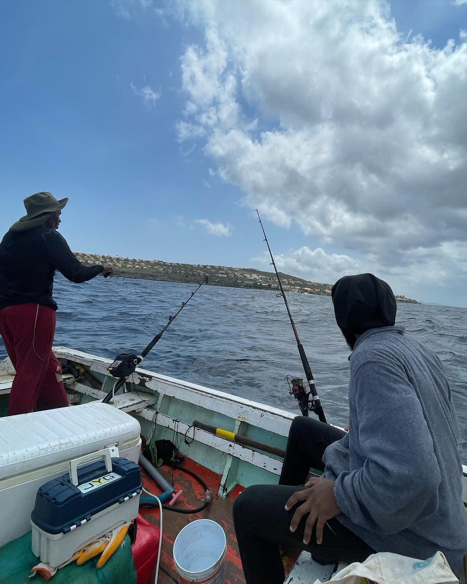 tyre_mcbride's tweet photo. These are the moments we cherish, my dad and I enjoyed enjoyed having you around when we went finishing.   I know you just chilled out and let us do our thing but one of the reason I like and love you so much, is how down to earth you are.  We both are Curaçaoans https://t.co/KOJIHRrNRZ