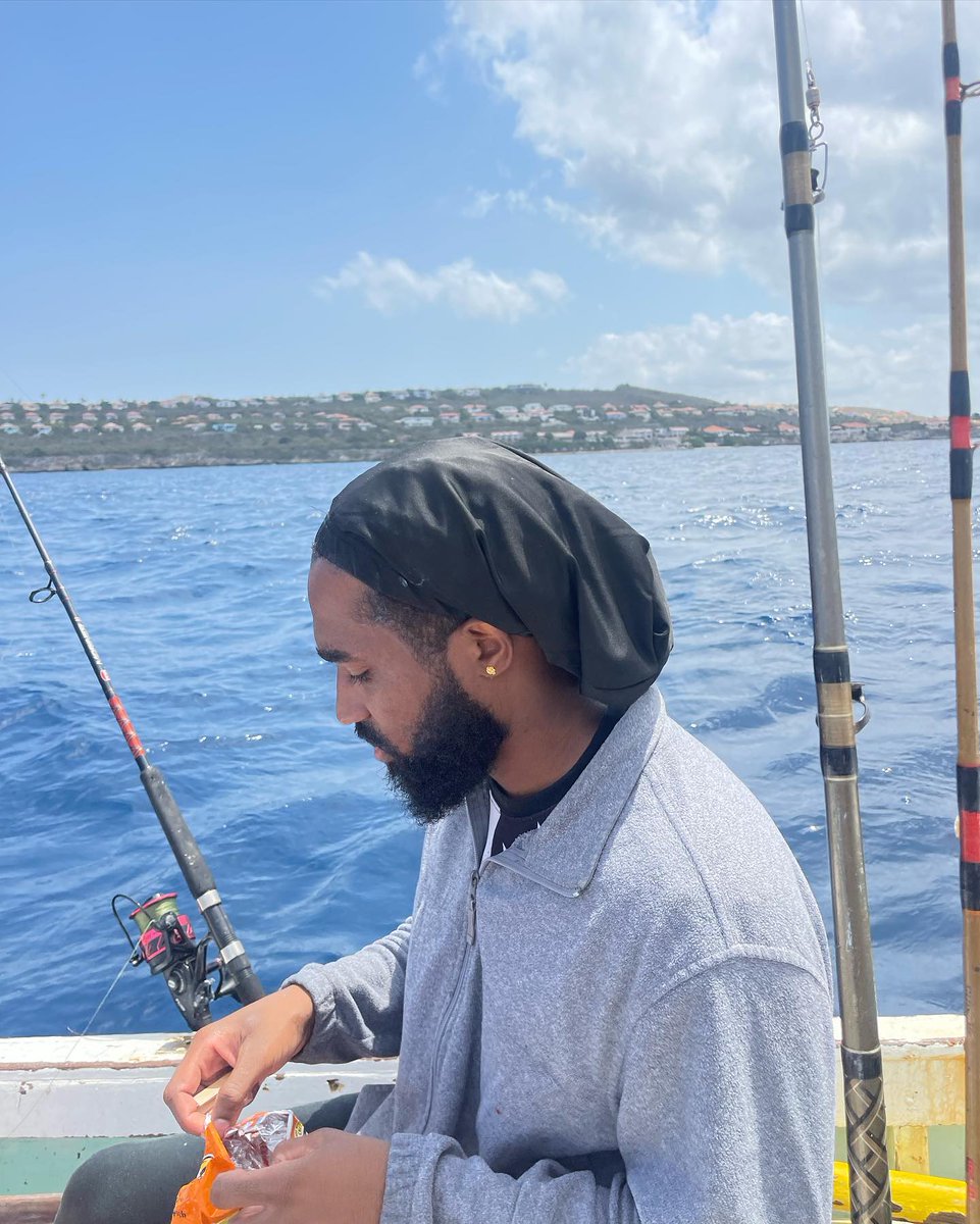 tyre_mcbride's tweet photo. These are the moments we cherish, my dad and I enjoyed enjoyed having you around when we went finishing.   I know you just chilled out and let us do our thing but one of the reason I like and love you so much, is how down to earth you are.  We both are Curaçaoans https://t.co/KOJIHRrNRZ