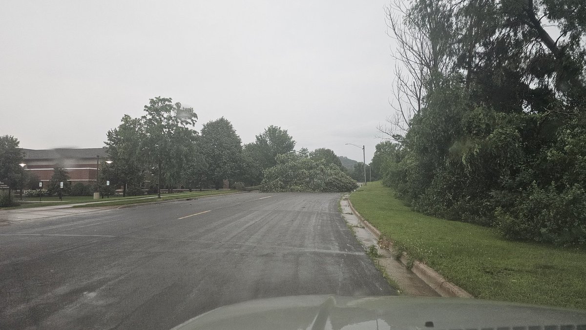 Bensciandgames's tweet photo. So here in #onalaska and north of #lacrosse the power is out and some trees are down as well as a few streets are flooded here is a picture of a tree down 

@NWSLaCrosse 
@news8news https://t.co/ovXzIyZvhG