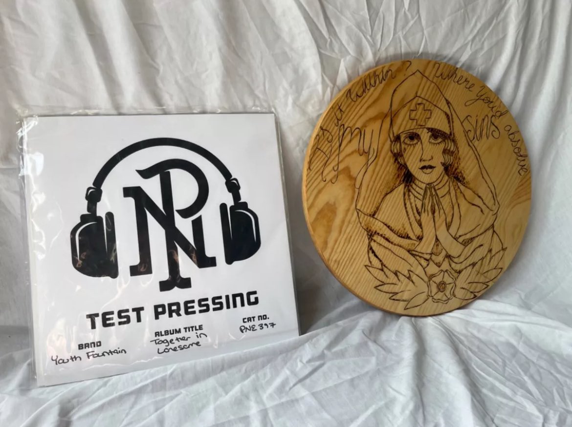youthfountain_'s tweet photo. Auction ends July 20 🚨 https://t.co/DFg2iUeGY2  Got a signed test press of Together in Lonesome along side with a wall hanger wood burning from the song ‘Vertigo’  and some Handwritten lyrics of ‘What Tomorrow Brings / Requiem’ // @purenoiserecs https://t.co/nrclHw3ZZZ
