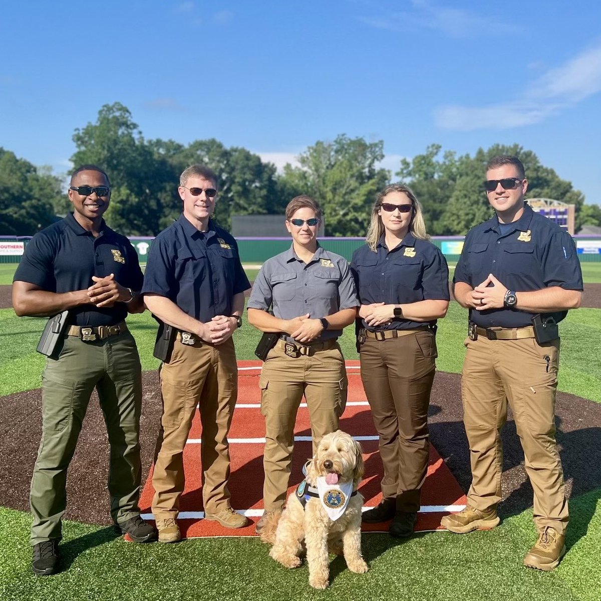 LAStatePolice's tweet photo. Earlier this week, Troopers from the Louisiana State Police Public Affairs Section attended the FBI LEEDA Media and Public Relations Course hosted at the Denham Springs Police Department. Cash, the comfort dog, was excited for his photo shoot.
#lsp
#FBILEEDA
#cash_dollarbill https://t.co/fhLh9j6FJe