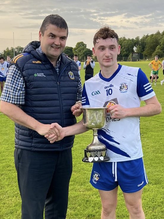 RoscommonGAA's tweet photo. Congratulations to St. Dominic’s ‘B’ who defeated Shannon Gaels by 3-06 to 1-07 in the Atlantic IPS Division 3 Football League Final. 

St. Dominic’s Captain, Robbie Gately received the Tansey Cup from Roscommon GAA Chairperson, Brian Carroll. 

#RosGAA https://t.co/SaPS2DQiGU